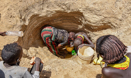 Women fetch water in one of the shallow wells along a dry river bed in Illeret.

The ravaging drought has led to a water shortage in the region forcing residents to look for alternative water sources, unsafe for human consumption.