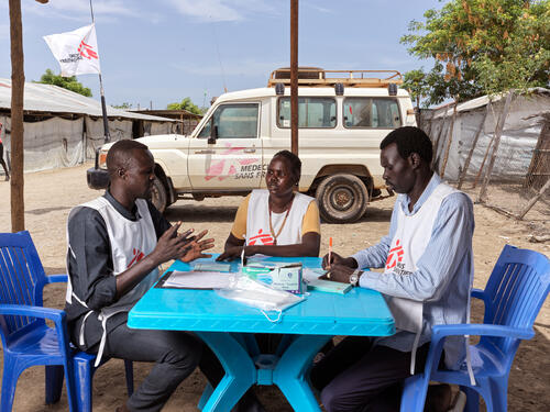 Community health workers in Bentiu internally displaced persons camp, discussing the hepatitis E vaccination campaign.