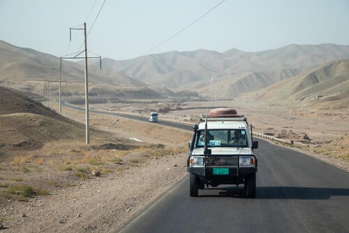An MSF Landcruiser driving on the road from Herat city to the remote districts of the province for an assessment of the needs in the community following multiple earthquakes.