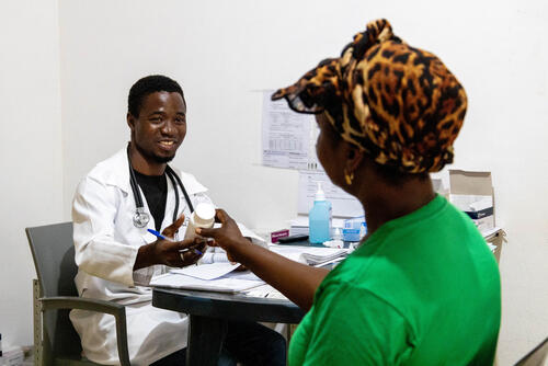 Maria Atonio, 43-years-old farmer from Macomia, talks to MSF’s Clinical Officer Mussa Rahamane Waide at MSF’s Clinic in Nanga, to receive ART and monitor her health. 

Maria was displaced in 2020 when Macomia village was attacked and returned home in 2022. Since she returned to Macomia, Maria has been collecting Anti-retroviral treatment at MSF’s clinic in Nanga.  

“Since June 2022, I have been coming to this clinic to collect my medication. I come once a month usually, and the services are quite good – the staff are very friendly and make us feel welcome and comfortable. I take my medication very seriously – one pill every morning.” Says Maria.