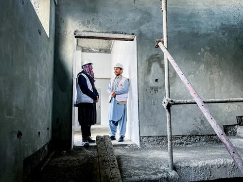 The MSF Construction Manager and the Construction Supervisor check on the ongoing work in the Khost Maternity Hospital compound.