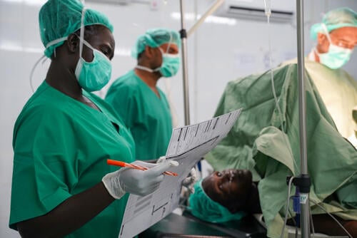 MSF nurse anaesthetist checks on Ita Joice’s vitals, eight-month pregnant, during her caesarean section in Mundari County Hospital, the only secondary healthcare facility in Kajo Keji, Central Equatoria.
