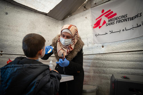 The MSF team conducts medical consultations with patients at a mobile clinic run by MSF in displacement camps in Sarmada area in northern Idlib governorate. 

 Northwest Syria, December 2023.
