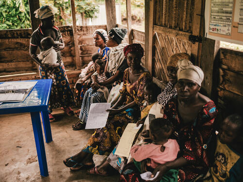Mothers and their children waiting for the malnutrition consultations at the MSF-supported Kishinji health center  located in the Minova health zone, 3km from the Bugeri IDP site. It welcomes both displaced persons and local people. Cases requiring more extensive medical support are referred to the Minova general referral hospital, also supported by MSF.