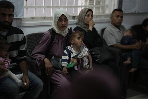A Palestinian mother identified as Donia Alouf, 33 years old and her son 1 year old Ahmed, who was diagnosed with malnutrition. Donia receives medical assistance in Gaza clinic in Gaza city. She is 8 months pregnant, she herself is also malnourished.