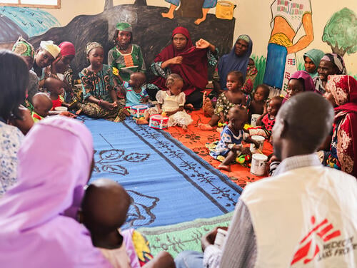 During a psychosocial session in the playroom, MSF staff, caregivers, and their children sit in a circle—children joyfully engaging with toys while mothers receive guidance on the impact of malnutrition on a child’s overall well-being. These sessions not only provide essential education on psychological support but also create a safe, nurturing space that strengthens the emotional bond between mother and child.