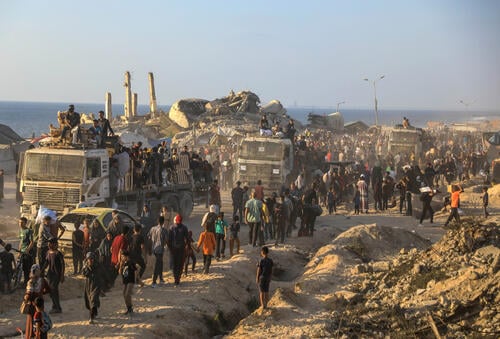 Palestinians at the GHF distribution site in Netzarim putting their lives at risk to receive some food.

The Gaza Humanitarian Foundation (GHF). All four distribution sites operated by the GHF are located in areas under full Israeli military control and “secured” by private American armed contractors.

Between 7 June and 24  July 2025, MSF health centres in close proximity received 1,380  injured people, including 28 dead bodies from the GHF sites with 174 gunshot wounded.

MSF calls for an immediate cessation of the GHF distribution mechanism and urges states and private donors to refrain from funding what is essentially a death trap.