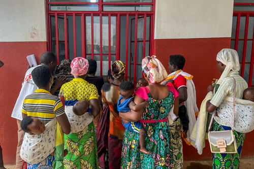 Mothers are waiting for the distribution of mosquito nets after the vaccination of their child at the Rugombo health centre, Cibitoke district. 

At this health centre, as in around 20 others across the district, each child receives four doses of the RTS,S malaria vaccine between the ages of six and 18 months. At the time of the first vaccination, families are also given an insecticide-treated mosquito net. Between the ages of nine and 24 months, children receive additional protection through sulfadoxine-pyrimethamine tablets, a method known as perennial malaria chemoprevention (PMC).