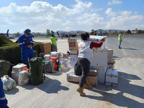 MSF staff prepare medical and humanitarian supplies for air transport to isolated communities.