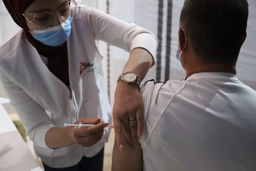 A man receives a dose of COVID-19 vaccine at the MSF vaccination center in Bar Elias (Bekaa Valley).