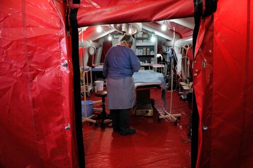 An inflatable operating theatre is erected inside this MSF makeshift hospital in Syria (a converted chicken farm) as it is an efficient way to maintain a sterile environment.
