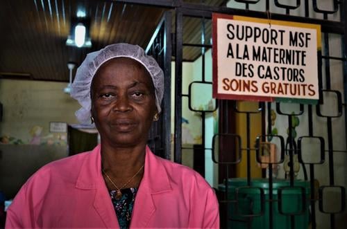 Ms Marie-Josée Yakité, MSF midwife at the Castors HRUB since 2014

"I’ve been working here with MSF at Castors since 2014. For 20 years, I worked at Castors before the arrival of MSF, and also at the Hôpital de l’Amitié – a big hospital in Bangui, the capital of the Central African Republic.
We often look after patients who can’t get treatment elsewhere because they don’t have the money. People know that here we offer quality care to everyone, free of charge. In health centres that are not managed by international organisations like MSF, you have to pay for everything. If a patient can’t pay, they send them here. I remember one lady who was referred to us from one of the main hospitals in Bangui. This woman had already been monitored for pre-eclampsia. When the medical staff realised that there was foetal distress, they referred her to us. Not because the hospital couldn’t treat this kind of complication – it was just a matter of money.
In the health centres where patients have to pay for their care, when women arrive in labour, the staff make an assessment of all the tests and the procedures that need to be performed, and an estimate of how much it will cost. And then they make them pay. And if they realise that the woman doesn’t have the money, and that she needs treatment she can’t afford, they prefer to refer her here at Castors because we don’t ask for any money for our services.
We also have women who show up here ready to give birth, but who, for lack of money, have not had any prenatal examinations or tests, for syphilis, toxoplasmosis or HIV for example. We see this very often, especially women who are HIV-positive. These women come to us in labour, without having had a prenatal HIV test. And in theory this test should be free, as it is covered by the Global Fund. Yet sometimes they force women to pay for a whole raft of prenatal tests and they refuse to do the HIV test if the women don’t do the other tests, for which they have to pay. They ask them to pay for the medical supplies, the gloves, the health card, everything.
Because of these financial questions, some people refuse to go to hospital. They prefer to stay at home and rely on traditional medicine. Not long ago, we treated a young woman of 19 who had taken traditional oxytocics. She wanted to give birth at home, she didn’t want to go to a health centre because she didn’t have the money to pay. But the dose of the medicine she took was too high – she ruptured her uterus and her baby died. When the family saw she had suffered a haemorrhagic shock, she was taken to the health centre near her home, which then referred her here to Castors. By the time she came here, three days had already passed. Luckily we managed to save her, but we had to carry out a hysterectomy. She already has a healthy child, but sadly for her, she can’t have any more.
It’s the referrals from other health centres that are the most complicated. Very often, these women come to us in a very serious condition. Sometimes they bring us a woman on the back of a motorbike, and she dies before making it to the door. I suspect that sometimes the health centres keep patients longer than they should in the hope that they might still squeeze something out of them. I tell all the women to come here to Castors as soon as they feel their first labour pains. Here we have qualified staff who can guarantee high-quality care to all patients, irrespective of who they are and where they come from."
