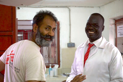 Nurse supervisor Joseph Azeem (left) and lab supervisor James Primo share a moment of camaraderie. Joseph is a long-time nurse for MSF who began his career as a national staff in Pakistan after the 2005 earthquake that hit his country. James is South Sudanese and moved to Doro to work with MSF in the camp.