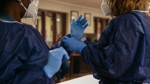 A staff member at Advantage Living Center in Roseville, Michigan, volunteers to demonstrate safe PPE (personal protective equipment) practices during a Doctors Without Borders/Médecins Sans Frontières (MSF) training on infection prevention and control. Essential staff in nursing homes and long-term care facilities, including the cleaners and other environmental services staff, work in close proximity to residents to care for their most basic and intimate needs, so they play a critical role in preventing the spread of coronavirus.