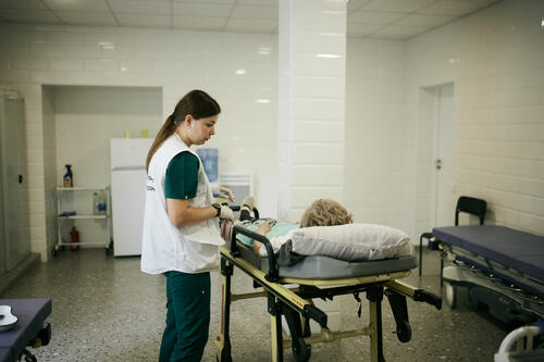 Hanna Dudnyk, MSF emergency doctor, examines, Svitlana, 67, who was brought to the emergency room by ambulance with complaints of loss of consciousness, and severe pain. 

"Svitlana was already treated at this hospital with the same symptoms, but she needs more extensive diagnostics than this hospital can provide. We can see that the patient has lost a significant amount of weight in four months, which is alarming. But, of course, the hospital will provide all the necessary medical care here and now to stabilise the woman's condition," said Hanna Dudnyk.   

This is far from an isolated case in Mykolaiv region, in the south of Ukraine. People are admitted to hospital with complex conditions, stabilised, and recommended for further examination, but they are often unable to travel to hospital in nearest city like Mykolaiv due to financial difficulties, limited mobility, and fear of leaving their homes due to the possibility of shelling.