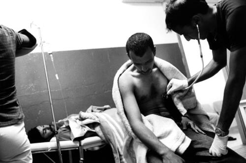 Lampedusa June 2003 - Inside the immigrants temporary stay centre - During a medical examination.