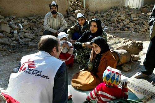 Mobile clinic in Baravat doing consultations. Many families decided to place their tent next to the ruins of their houses. Iran, January 2004, Bam earthquake