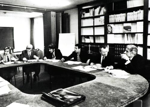 Signing of Médecins Sans Frontières' charter, in Paris. 1/2 of a panoramic photo. Other half: MSF7927

Signature de la charte MSF, a Paris. Autour de la table, les fondateurs de MSF: Dr. Marcel Delcourt, Dr. Max Recamier, Dr. Gerard Pigeon, Dr. Bernard Kouchner, Raymond Borel, Dr. Jean Cabrol, Vladan Radoman, Dr. Jean-Michel Wild, Dr. Pascal Greletty-Bosviel, Dr. Jacques Beres, Gerard Illiouz, Phillippe Bernier, Dr. Xavier Emmanuelli.Demi photo agrandie de l'image parue dans Tonus